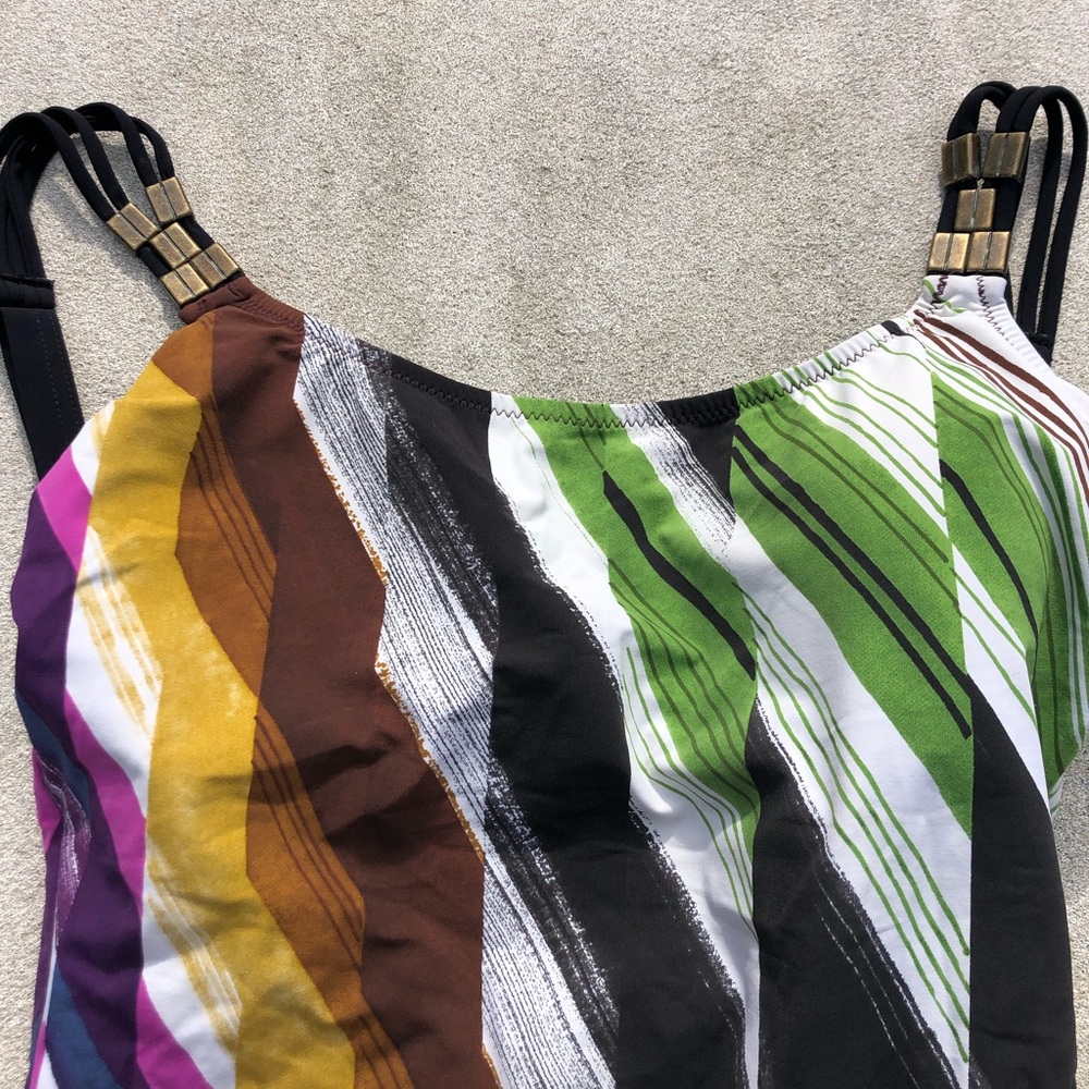 One piece purchased in Aruba. Used twice and cleaned from 2 years ago